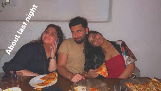 On Thursday, Ajay Devgn's daughter Nysa Devgan partied with her close friend Orhan Awatramani in Mumbai. Orhan shared a bunch of pictures from the night on his Instagram Stories on Friday. In one photo, Nysa is seen wearing a red dress as he rests her head on Orhan's shoulder, with her eyes closed. 