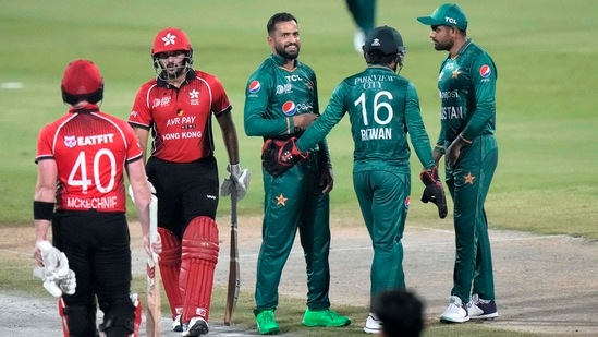 Mohammad Nawaz (center) celebrates with teammates after taking the wicket of Kinchit Shah (second left) during Asia Cup between Pakistan and Hong Kong,(AP)