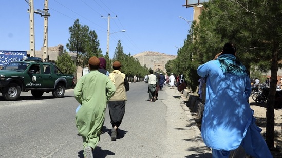 Afghan people run near the site of an explosion in Herat province, Afghanistan, Friday, Sept 2, 2022. (AP) Afghan people run near the site of an explosion in Herat province, Afghanistan, Friday, Sept 2, 2022. (AP)