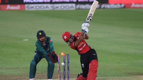 Hong Kong's Ayush Shukla is bowled out by Shadab Khan during the Asia Cup match between Pakistan and Hong Kong at the Sharjah Cricket Stadium(AFP)