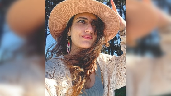 Fatima Sana Shaikh added more boho touch to her look by accessorising her outfit with multi-colour dangler earrings.(Instagram/@fatimasanashaikh)