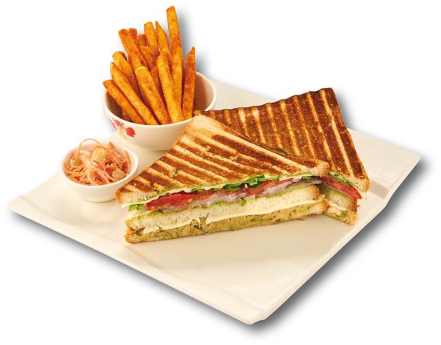The Amdavadi double decker with cheese, potatoes, Kothmir chutney, tomato, capsicum, chillis and onion at ITC Narmada The Amdavadi double decker with cheese, potatoes, Kothmir chutney, tomato, capsicum, chillis and onion at ITC Narmada
