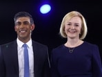 FILE PHOTO: Conservative leadership candidates Liz Truss and Rishi Sunak stand together as they attend a hustings event, part of the Conservative party leadership campaign, in London.
