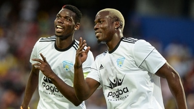 Paul Pogba poses for a photo with his brother. (AFP) Paul Pogba poses for a photo with his brother. (AFP)