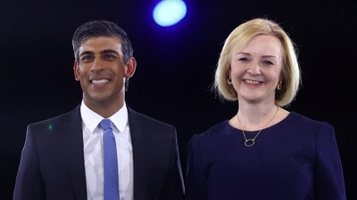 FILE PHOTO: Conservative leadership candidates Liz Truss and Rishi Sunak stand together as they attend a hustings event, part of the Conservative party leadership campaign, in London. (REUTERS)