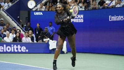 Serena Williams, of the United States, returns a shot to Ajla Tomljanovic, of Australia, during the third round of the U.S. Open tennis championships, Friday, Sept. 2, 2022, in New York. (AP Photo/John Minchillo) (AP) Serena Williams, of the United States, returns a shot to Ajla Tomljanovic, of Australia, during the third round of the U.S. Open tennis championships, Friday, Sept. 2, 2022, in New York. (AP Photo/John Minchillo) (AP)