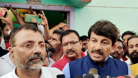 BJP MPs Nishikant Dubey and Manoj Tiwari were in Deoghar to meet the family of the girl who was set ablaze by a stalker in Dumka. (ANI)