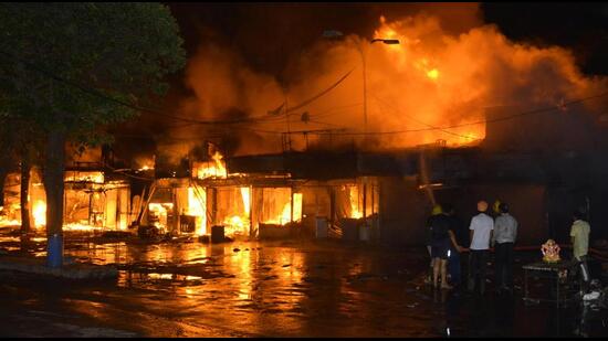 The Thursday night fire had gutted all 148 shops in the market, leaving the shopkeepers bankrupt ahead of festive season. (Sant Arora/HT)