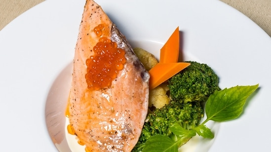 Increase omega-3 intake: Add food that is rich in omega-3 like fish, nuts, seeds, and flaxseed/canola oil to your diet. Studies suggest that omega-3s improve female fertility.(Unsplash)