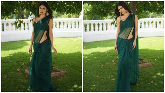 Today, Mouni dropped pictures of herself dressed in a green saree and a stylish blouse on Instagram. The Brahmastra actor wore the six yards for promoting the film and captioned the post, "Brahamastra promotions." Her bespoke look is from the shelves of the clothing label Mala and Kinnary India. Keep scrolling to see all photos.(Instagram)