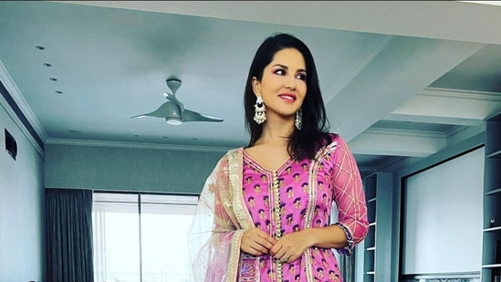 Sunny Leone decked up in a pink suit for Ganesh Chaturthi celebrations at her home. She shared photos and videos of her look on Instagram.
