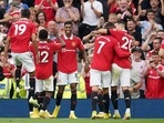Manchester United's Marcus Rashford, centre, celebrates after scoring his side's second goal
