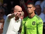 Dutch manager Erik ten Hag (L) directs substitute Cristiano Ronaldo during the Premier League match between Southampton and Manchester United at St Mary's Stadium.