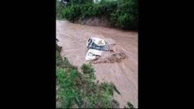 On July 8, a cab driver and a woman passenger were also swept away following flash floods. (HT PHOTO )