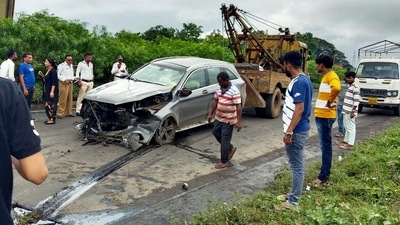 Wrecked remains of a car being dragged by a crane in which former chairman of Tata Sons Cyrus Mistry died in a crash in Palghar on Sunday. (ANI) Wrecked remains of a car being dragged by a crane in which former chairman of Tata Sons Cyrus Mistry died in a crash in Palghar on Sunday. (ANI)