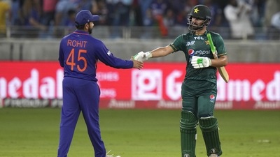 India's captain Rohit Sharma, left, congratulates Pakistan's Khushdil Shah after Pakistan won the T20 cricket match of Asia Cup (AP) India's captain Rohit Sharma, left, congratulates Pakistan's Khushdil Shah after Pakistan won the T20 cricket match of Asia Cup (AP)