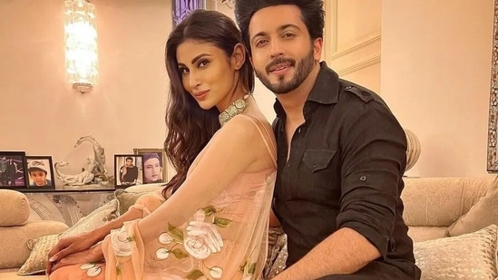 Mouni Roy returned from the Brahmastra promotional event in Hyderabad to be right in time for Ekta Kapoor's Ganpati gathering on Saturday. Mouni, who plays the antagonist in Brahmastra, posed with Dheeraj Dhoopar, who is currently participating on Jhalak Dikhhla Jaa season 10.&nbsp;