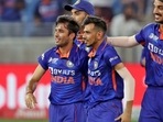 Ravi Bishnoi (L) with Yuzvendra Chahal, accompanied by other India teammates