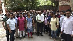 Mahira Homes buyers protesting at Department of Town and Country Planning office in Gurugram on Friday.  (Vipin Kumar/HT Photo)