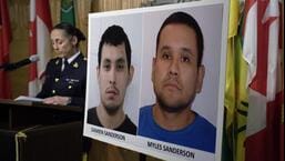 Assistant Commissioner Rhonda Blackmore speaks next to images of Damien Sanderson and Myles Sanderson during a press conference at Royal Canadian Mounted Police F Division Headquarters in Regina, Saskatchewan on Sunday.  (AP)