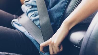 Asian woman fastening seat belt in the car, safety concept (Getty Images/iStockphoto) Asian woman fastening seat belt in the car, safety concept (Getty Images/iStockphoto)
