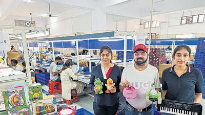 Jitender Singh with his daughters at their toy manufacturing unit in Kundli. (HT Photo) Jitender Singh with his daughters at their toy manufacturing unit in Kundli. (HT Photo)