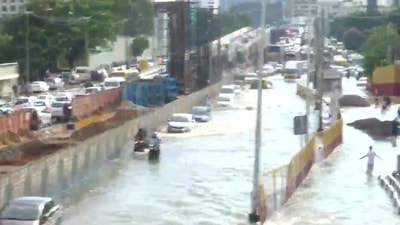 "This happens every year, waterlogging takes place after the rain and we have to pump out water. There is no permanent solution. When the road was being made, the drainage system wasn't prepared well. It leads to many difficulties for the public, many women have actually slipped and fallen into the water," another local said. (ANI) "This happens every year, waterlogging takes place after the rain and we have to pump out water. There is no permanent solution. When the road was being made, the drainage system wasn't prepared well. It leads to many difficulties for the public, many women have actually slipped and fallen into the water," another local said. (ANI)