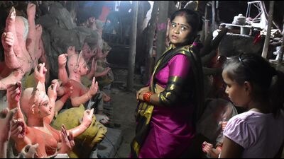 Idols of Goddess Durga being made at a workshop for the forthcoming festival of Durga Puja in Prayagraj. (HT Photo)