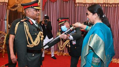 The visiting army chief General Pande was conferred the honorary rank of general of the Nepali Army by President Bidya Devi Bhandari on Monday as a tradition of friendship between both the armies. (AFP) The visiting army chief General Pande was conferred the honorary rank of general of the Nepali Army by President Bidya Devi Bhandari on Monday as a tradition of friendship between both the armies. (AFP)