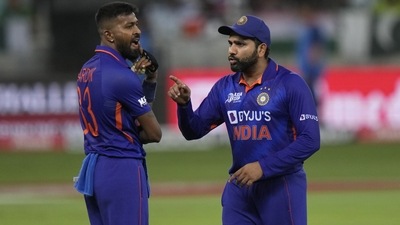 Hardik Pandya listens to captain Rohit Sharma during Asia Cup match against Pakistan (AP) Hardik Pandya listens to captain Rohit Sharma during Asia Cup match against Pakistan (AP)
