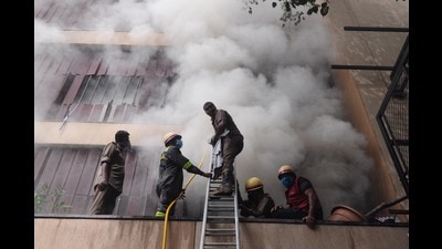 Firefighters dousing the flames at Levana Suites hotel in Lucknow Monday. (Deepak Gupta/HT Photo) Firefighters dousing the flames at Levana Suites hotel in Lucknow Monday. (Deepak Gupta/HT Photo)