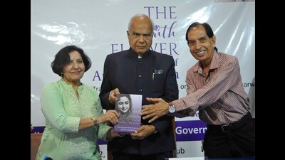 UT administrator Banwarilal Purohit with Jyoti Sabharwal (left) during the release of the ‘The Ninth Flower’ at Chandigarh Press Club on Monday. (Keshav Singh/HT)