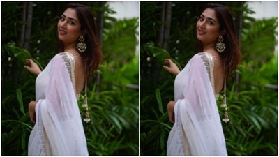 In the end, Disha chose ornate gold-toned jhumkis decorated with multi-coloured stones and beads to accessorise the traditional outfit. What do you think of Disha's look in this white saree? (Instagram)