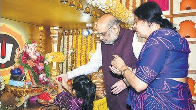 Union home minister Amit Shah along with his wife Sonal Shah worships lord Ganesh at the residence of deputy chief minister Devendra Fadnavis on Monday. ANI Union home minister Amit Shah along with his wife Sonal Shah worships lord Ganesh at the residence of deputy chief minister Devendra Fadnavis on Monday. ANI