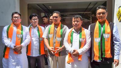The five Manipur legislators were formally accorded a warm welcome by BJP national president JP Nadda at his office in New Delhi on Sunday after they crossed over from the JD(U) (PTI) The five Manipur legislators were formally accorded a warm welcome by BJP national president JP Nadda at his office in New Delhi on Sunday after they crossed over from the JD(U) (PTI)