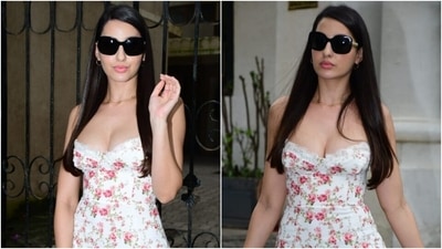 Nora Fatehi in a thigh-slit midi dress will convince you to add floral outfits to your cart right now (Instagram) Nora Fatehi in a thigh-slit midi dress will convince you to add floral outfits to your cart right now (Instagram)