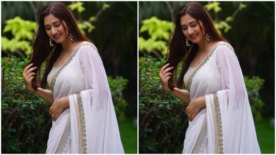 On Monday, Disha displayed her love for ethnic fashion by draping herself in a beauteous white saree and a backless blouse. The Bade Achhe Lagte Hain 2 star posted the pictures with the caption, "Chandni [Moonlight] (moon and sparkle emoji)."(Instagram)