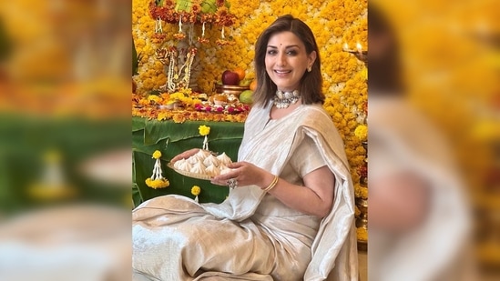 For Ganesh Chaturthi, Sonali Bendre wore a bright light metallic sari from the same label.(Instagram/@sonalibendre)