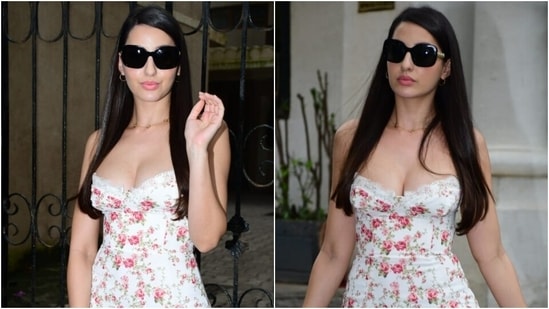 Nora Fatehi Looks Like A Dream Come True In Her Black Floral Midi Dress  With A High Slit