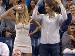 Megan Lucky chugs her beer at the US Open.