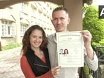 The newly married couple with their marriage certificate in Dharamshala, Himachal Pradesh. (@ANI/ Twitter ) The newly married couple with their marriage certificate in Dharamshala, Himachal Pradesh. (@ANI/ Twitter )