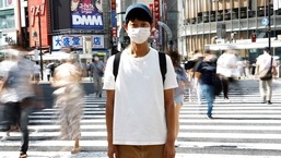 Shoji Morimoto poses at Shibuya crossing in Tokyo, Japan.