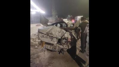 The family was headed towards Ludhiana from Chandigarh when the driver lost control over the speeding vehicle around 2.30 am. The car hit a wall before overturning near Veer Palace in Ludhiana. (HT PHOTO ) The family was headed towards Ludhiana from Chandigarh when the driver lost control over the speeding vehicle around 2.30 am. The car hit a wall before overturning near Veer Palace in Ludhiana. (HT PHOTO )