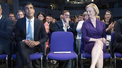 Liz Truss (right) looks across Rishi Sunak at the Queen Elizabeth II Centre in London, on Monday. (AP) Liz Truss (right) looks across Rishi Sunak at the Queen Elizabeth II Centre in London, on Monday. (AP)