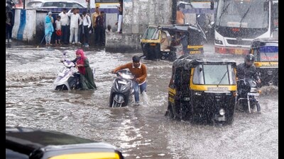 Waterlogging at Swargate chowk on Tuesday. (Rahul Raut/HT PHOTO)