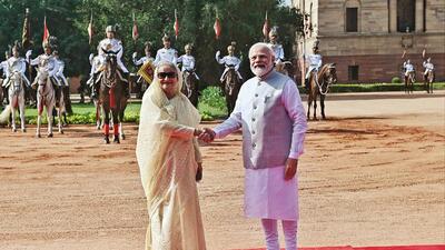 Prime Minister Narendra Modi receives Bangladesh Prime Minister Sheikh Hasina in a ceremonial welcome, at Rashtrapati Bhavan, in New Delhi on Tuesday (ANI/ PIB) Prime Minister Narendra Modi receives Bangladesh Prime Minister Sheikh Hasina in a ceremonial welcome, at Rashtrapati Bhavan, in New Delhi on Tuesday (ANI/ PIB)