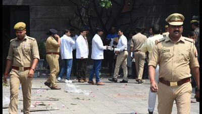 Forensics carrying out investigations at Levana Suites, where four people were killed in a fire tragedy. (Deepak Gupta/HT Photo)