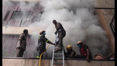Firefighters dousing the flames at Levana Suites in Lucknow on Monday. (Deepak Gupta/HT Photo) Firefighters dousing the flames at Levana Suites in Lucknow on Monday. (Deepak Gupta/HT Photo)