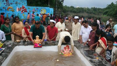 PMC collects 15,651 Ganesh idols from 15 regional ward offices at Wagholi stone quarry till Monday. (HT)