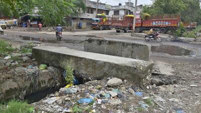 Transport Nagar area in miserable condition. Heaps of garbage, stagnant water, dilapidated roads and also drainage system of the area in Ludhiana is already collapsed. Truck drivers and transporters also complained that there is no security by police during the night time. (Gurpreet Singh/HT) Transport Nagar area in miserable condition. Heaps of garbage, stagnant water, dilapidated roads and also drainage system of the area in Ludhiana is already collapsed. Truck drivers and transporters also complained that there is no security by police during the night time. (Gurpreet Singh/HT)